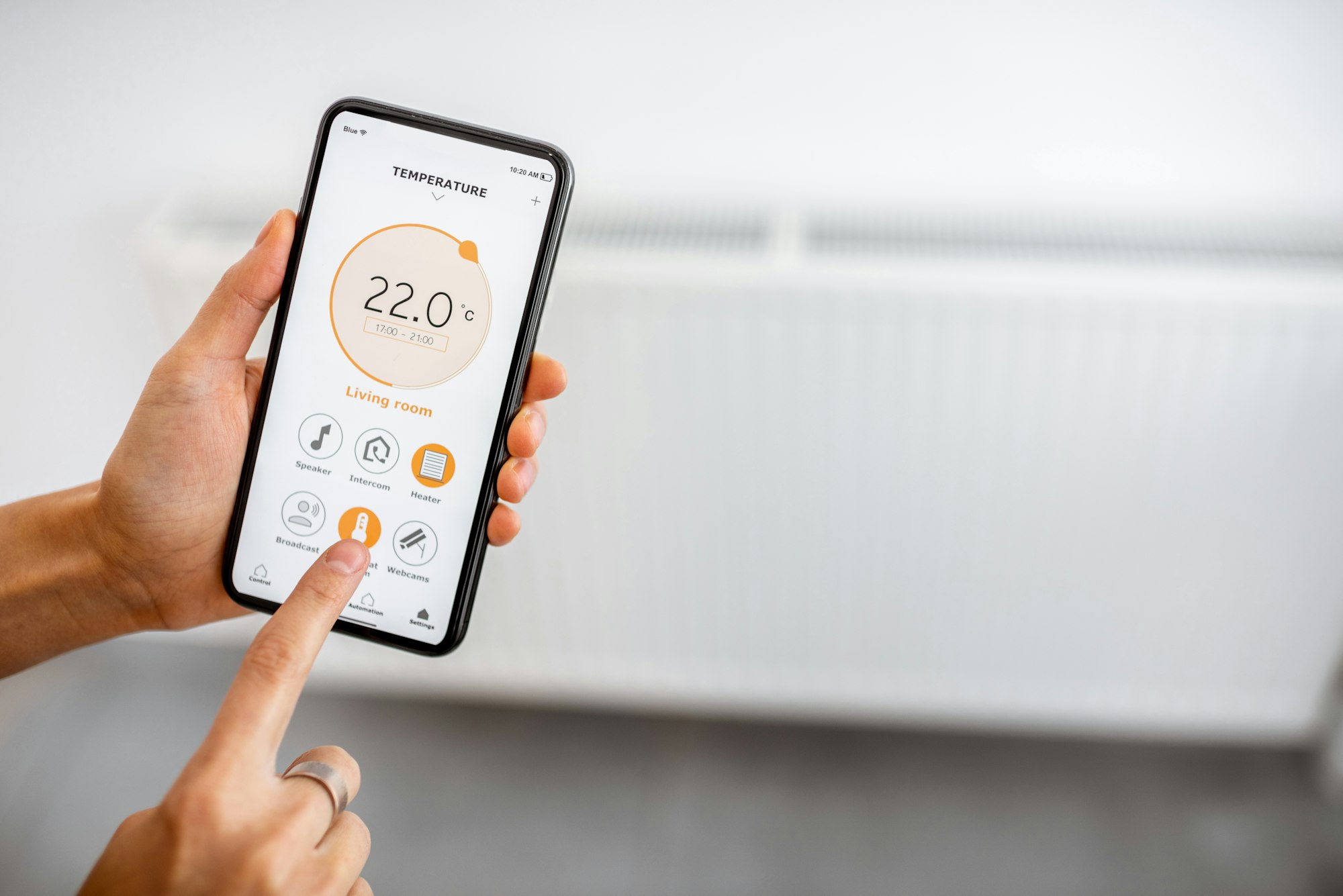 Controlling heating with a smart phone at home