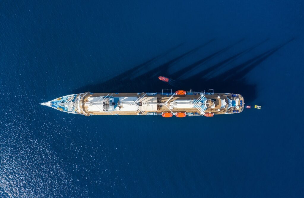 Dubrovnik, Croatia. Aerial view at the cruise ship with sail. Adventure and travel.