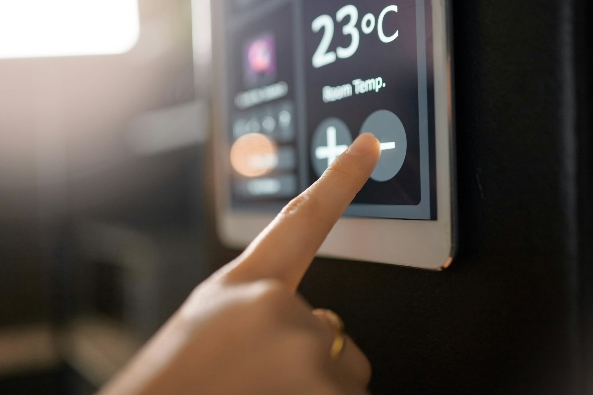 Smart home system, wall and woman hands with digital app monitor for thermostat heating, temperatur